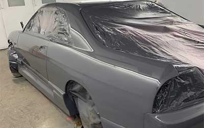 Nissan GTS-T in for refitting of body kit and full colour change repaint.