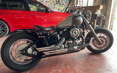 Bopper motorcycle in for Shorter rear mudguard and fresh tank painted two new colours and matte lacquered.