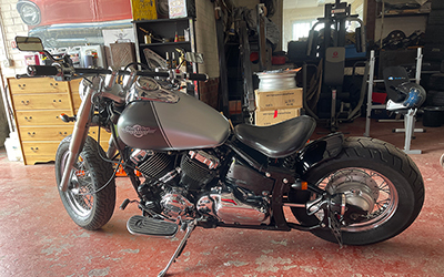 Bopper motorcycle in for Shorter rear mudguard and fresh tank painted two new colours and matte lacquered.