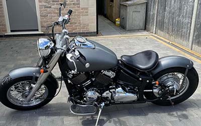 Bopper motorcycle in for Shorter rear mudguard and fresh tank painted two new colours and matte lacquered.